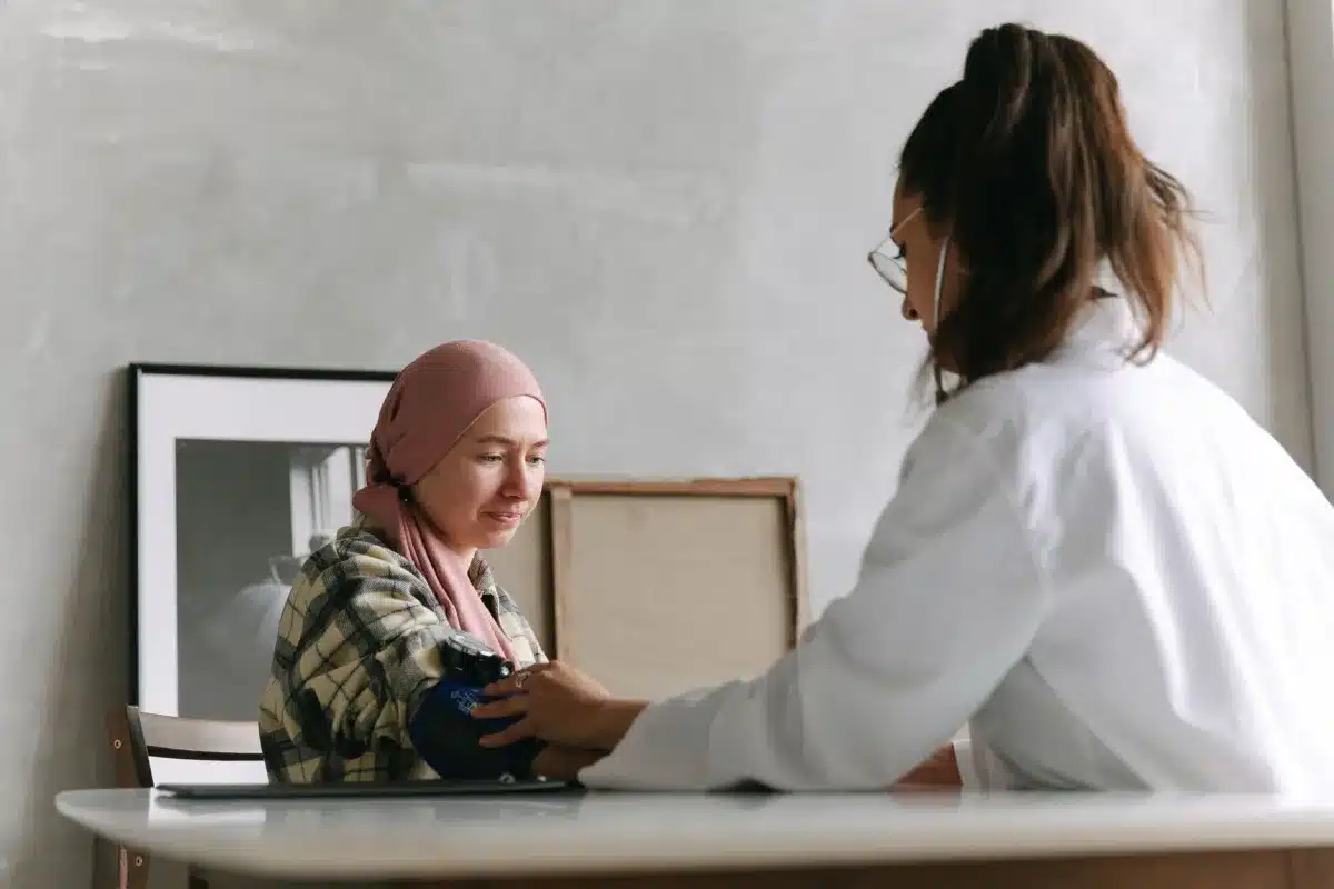 Primary care provider conducting an annual wellness exam with a patient in Arlington TX