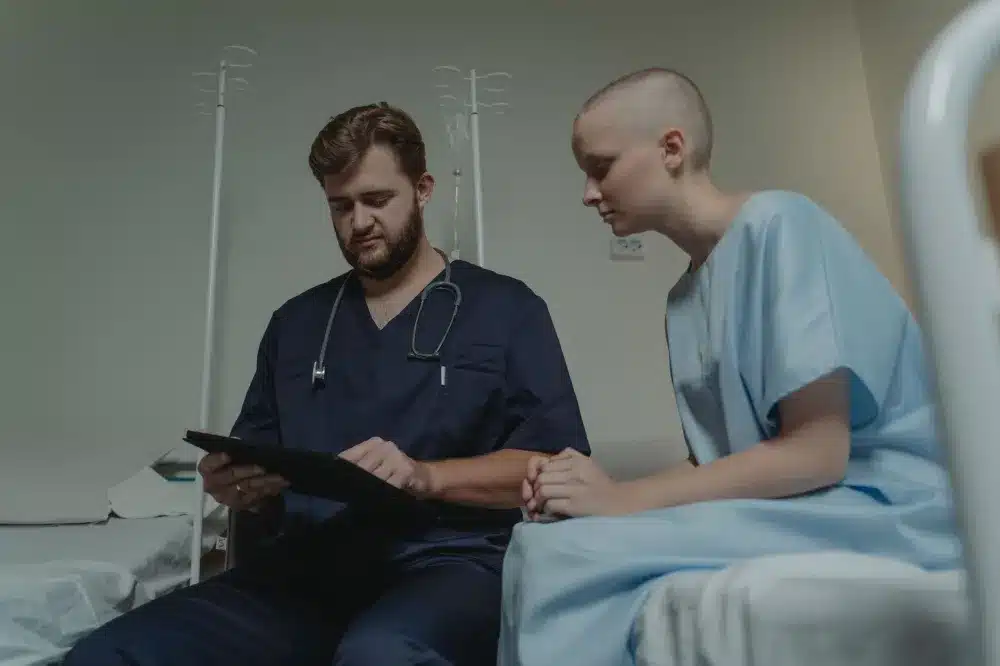 Healthcare provider reviewing remote monitoring data on tablet for Euless TX patient