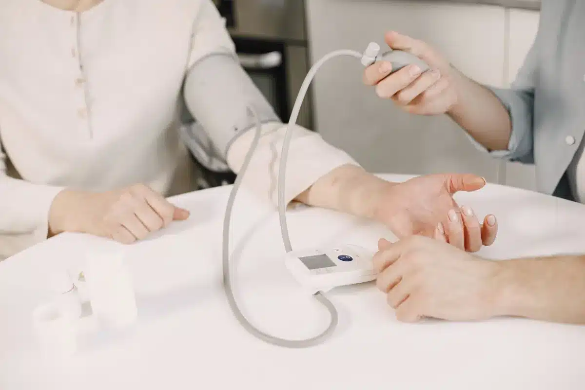 Patient using remote patient monitoring device at home for chronic condition management in Euless TX