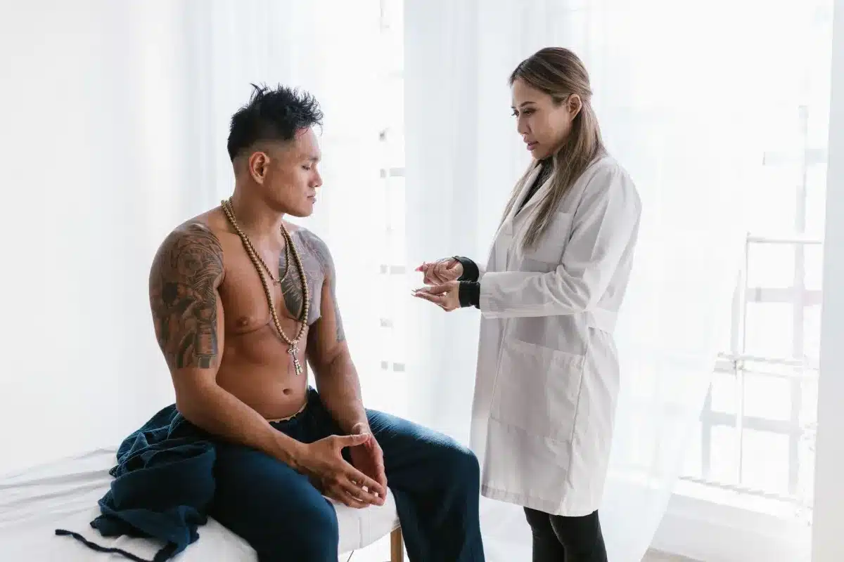 Provider discussing gastroenterology care with patient at Oak Lawn Dallas clinic