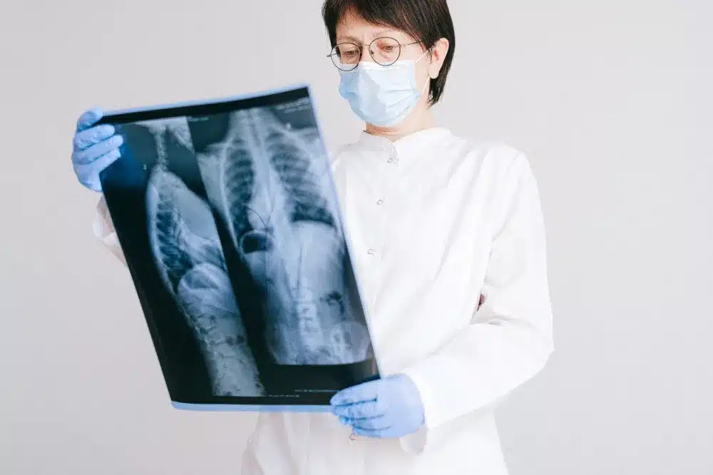 Physician reviewing metabolic lab results with patient during weight loss management visit